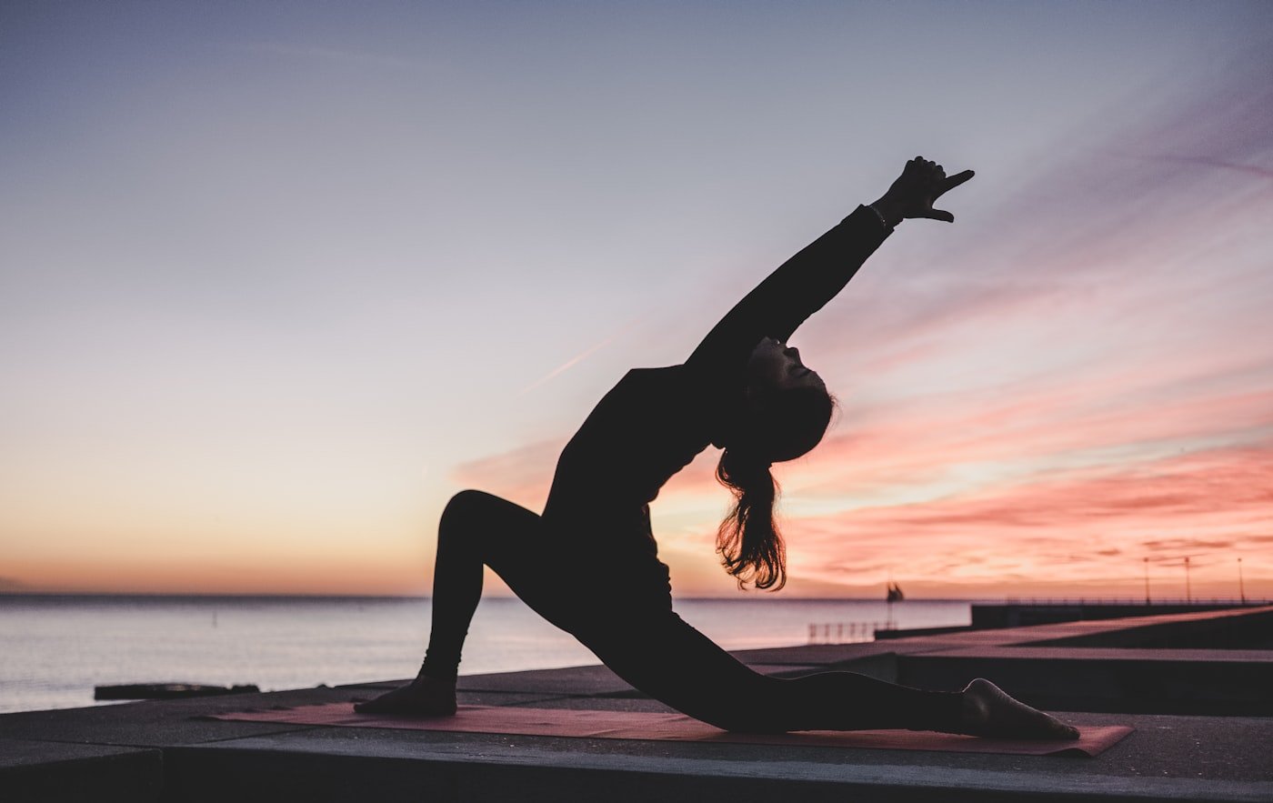 Woman taking a calm self-care moment during her period