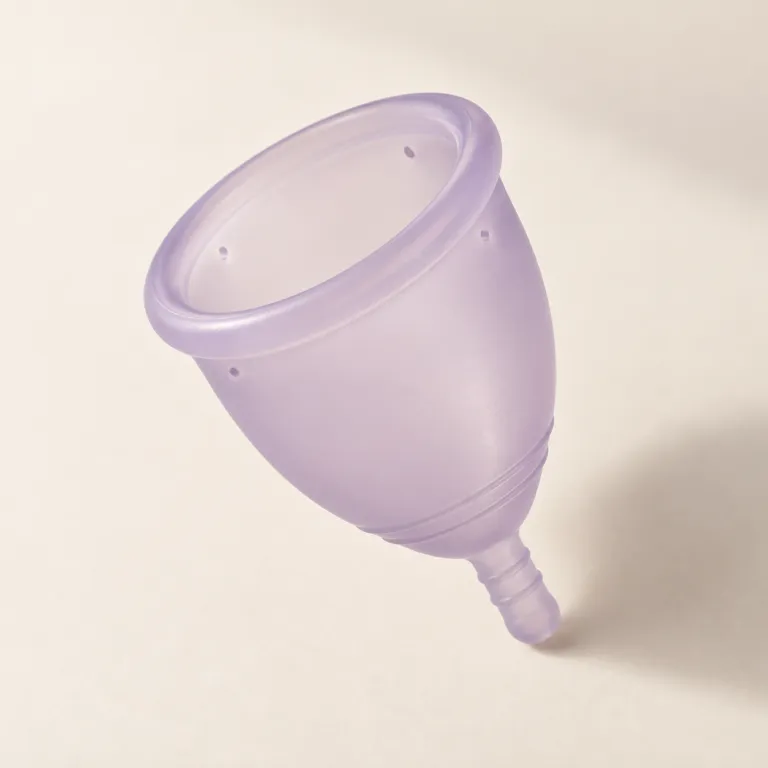 Medium menstrual cup in soft lilac silicone
