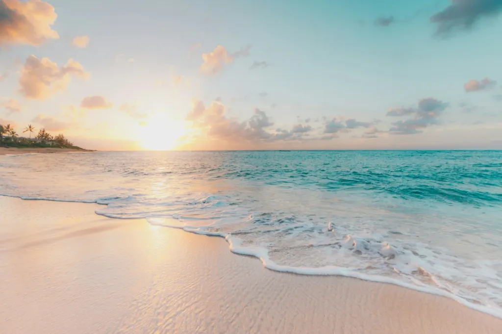Tropical beach at sunset for period swimwear confidence