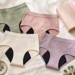 High-waist period panties flat-lay in soft pastels